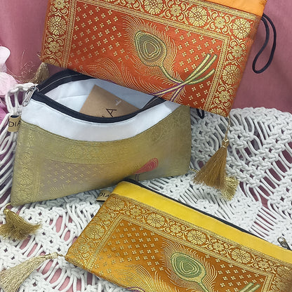Neceseres en seda elegante con borlas y cremallera. Artesanía India.Envío Gratis.