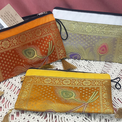 Neceseres en seda elegante con borlas y cremallera. Artesanía India.Envío Gratis.