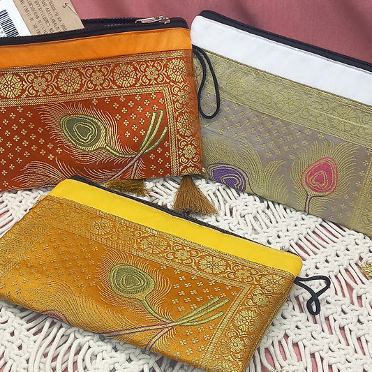Neceseres en seda elegante con borlas y cremallera. Artesanía India.Envío Gratis.