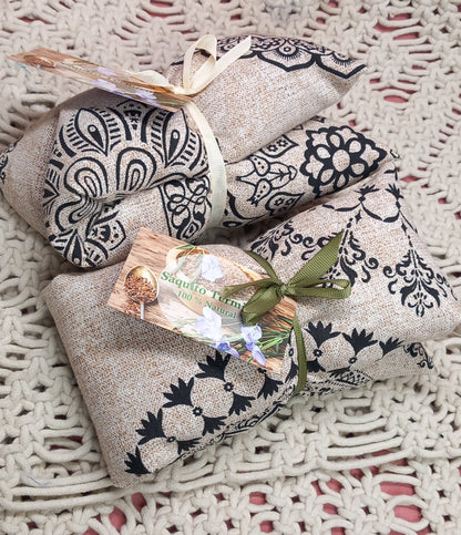 Sack of clovers on tan background.