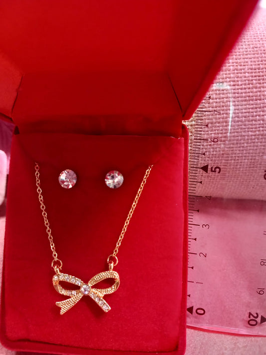 SENSUAL BOW Swarovski effect diamond earrings + chain + pendant set.