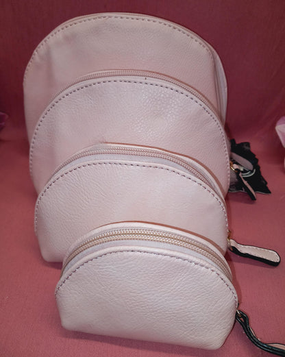 Nude Toilet Set (4 pieces). 4 leatherette toiletry bags.