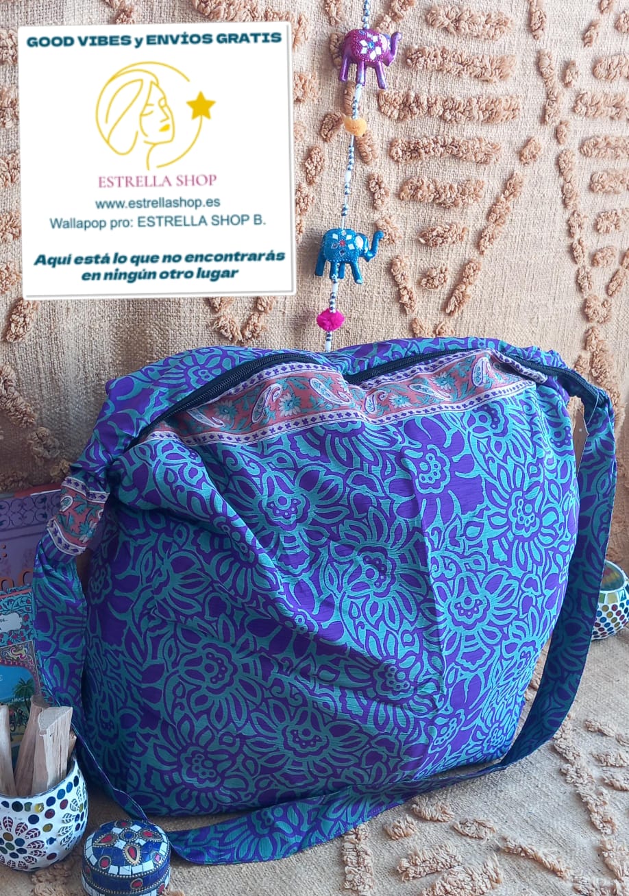 Bolso india de escapada, fin de semana,playa,montaña, gimansio...Con cremallera.

Bolso elaborado en tejido indio y con estampados étnicos, en colores mágicos.

Tiene una forma amplia con cierre cremallera y un asa para poder colgarla cómodamente estilo bandolera.

Todos son únicos y diferentes. Tenemos muchos modelos.

Medidas aproximadas 50 cm.

Envío gratis.