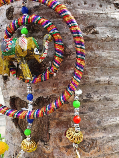 Colgador móvil ELEFANTES círculos con pompones y campanitas.Envio Gratis.
