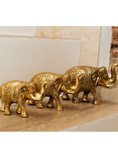 SET 3 ELEFANTES METAL DORADO O PLATEADO.10CM -Un conjunto decorativo que irradia elegancia y simbolismo hecho a mano.Envío Gratis.